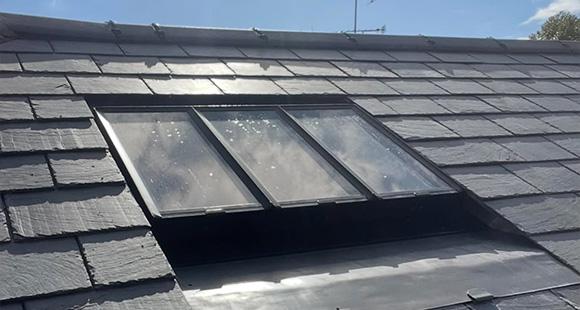 solar panels on a green rooftop with lush vegetation and residential buildings in the background showcasing sustainable energy solutions for a cleaner future 9 benefits of solar energy